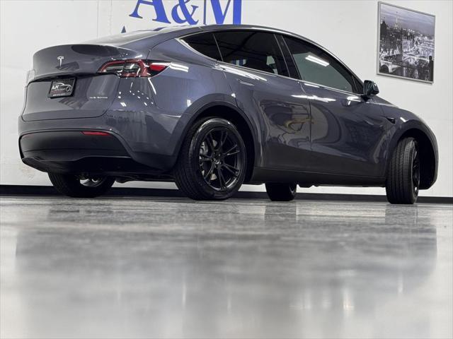 used 2023 Tesla Model Y car, priced at $38,995