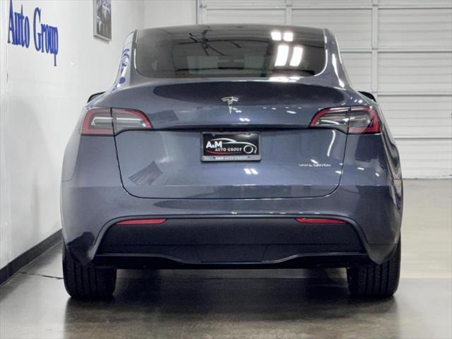 used 2023 Tesla Model Y car, priced at $38,995