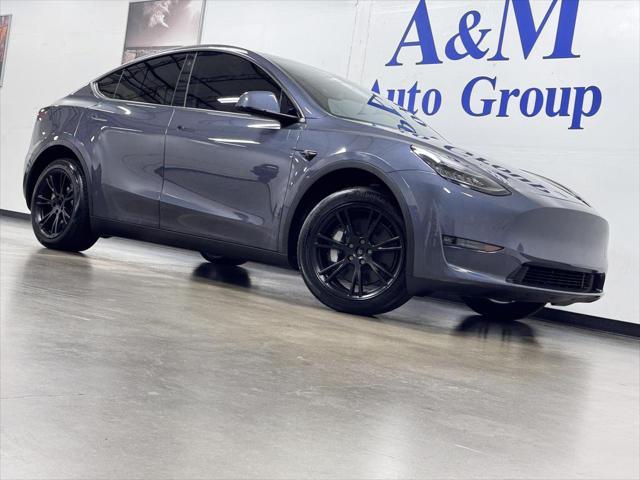 used 2023 Tesla Model Y car, priced at $38,995