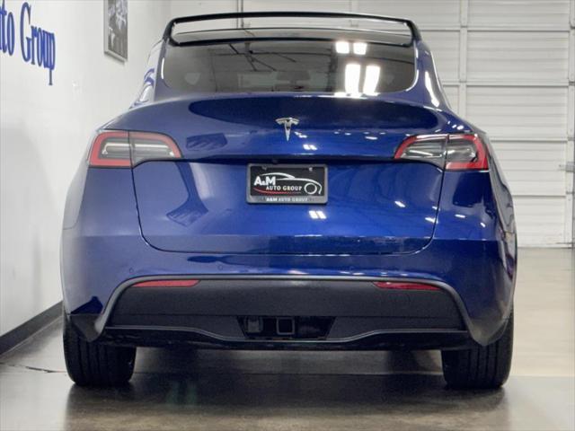 used 2021 Tesla Model Y car, priced at $28,995