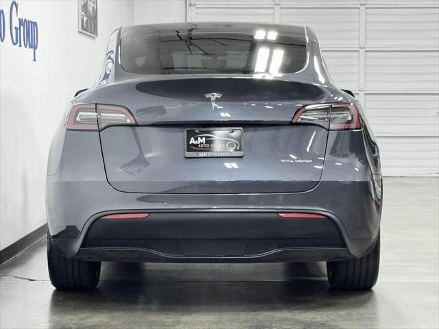 used 2022 Tesla Model Y car, priced at $39,995