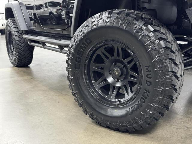 used 2014 Jeep Wrangler Unlimited car, priced at $23,995