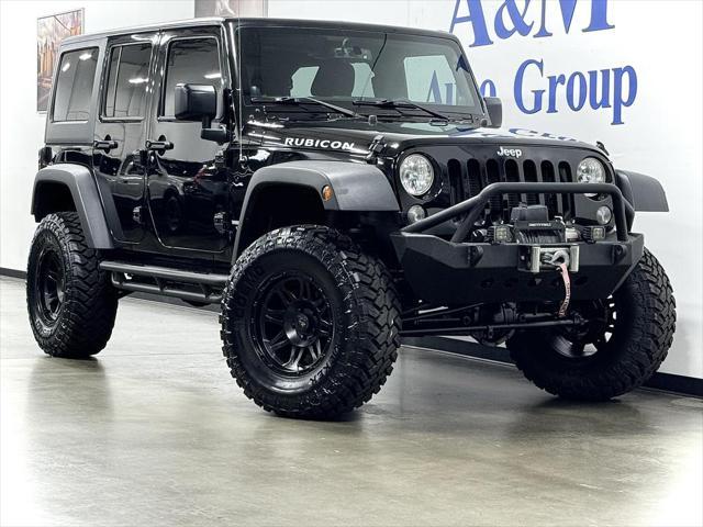 used 2014 Jeep Wrangler Unlimited car, priced at $23,995