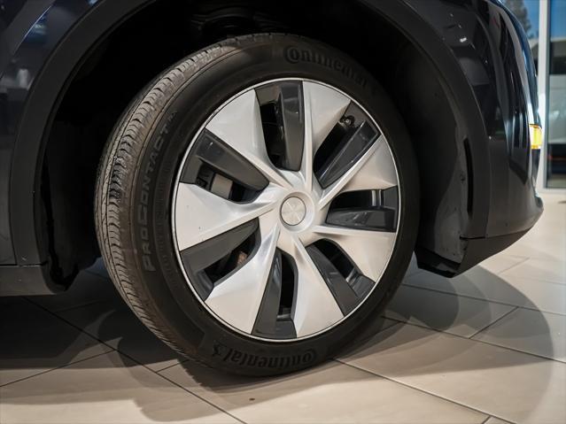 used 2024 Tesla Model Y car, priced at $34,000