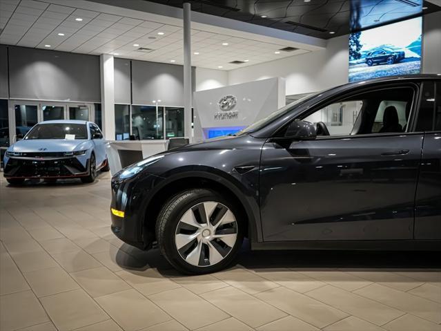 used 2024 Tesla Model Y car, priced at $34,000