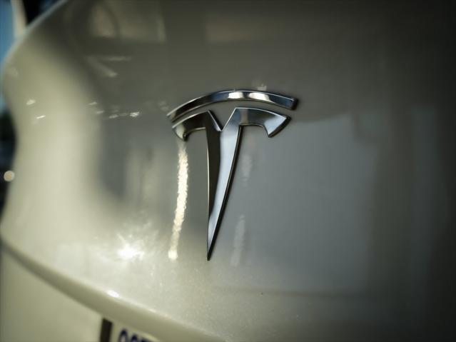 used 2018 Tesla Model 3 car, priced at $23,000