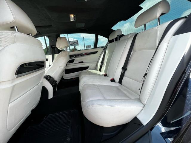 used 2015 BMW 750 car, priced at $16,995