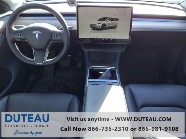 used 2024 Tesla Model Y car, priced at $35,900