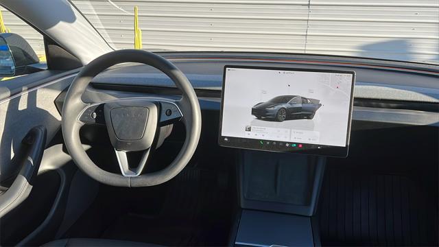 used 2024 Tesla Model 3 car, priced at $31,124