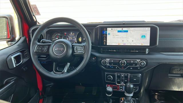 used 2024 Jeep Wrangler 4xe car, priced at $43,645
