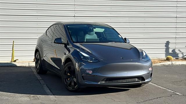 used 2023 Tesla Model Y car, priced at $37,128