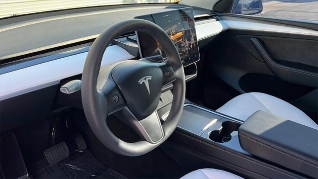 used 2023 Tesla Model Y car, priced at $37,128