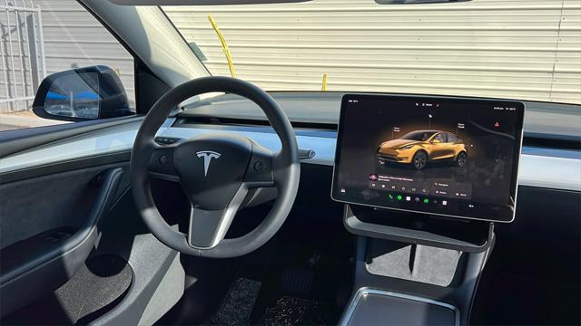 used 2023 Tesla Model Y car, priced at $37,128