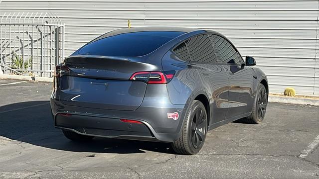 used 2023 Tesla Model Y car, priced at $37,128