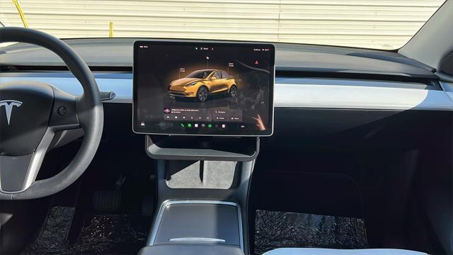 used 2023 Tesla Model Y car, priced at $37,128