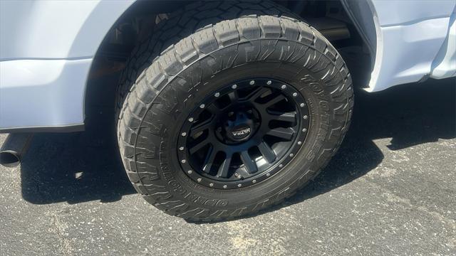 used 2019 Ford F-150 car, priced at $28,124