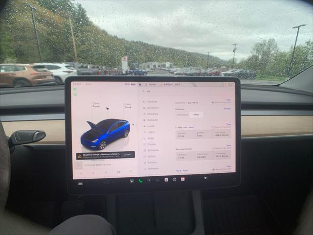 used 2024 Tesla Model Y car, priced at $31,998