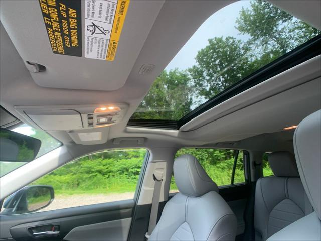 used 2021 Toyota Highlander Hybrid car, priced at $38,998