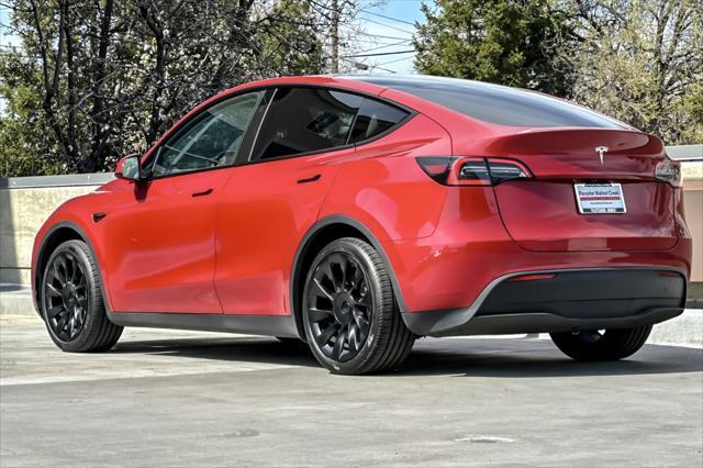 used 2023 Tesla Model Y car, priced at $32,894