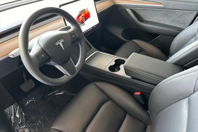 used 2023 Tesla Model Y car, priced at $32,894