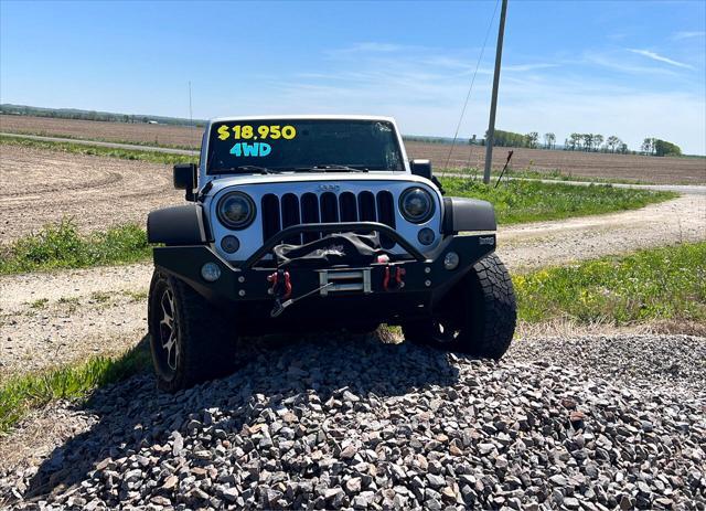 used 2012 Jeep Wrangler Unlimited car, priced at $17,495