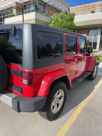 used 2014 Jeep Wrangler Unlimited car, priced at $13,989