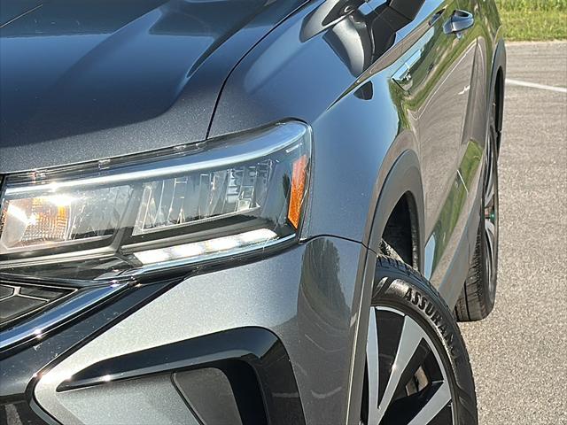 used 2024 Volkswagen Taos car, priced at $24,500
