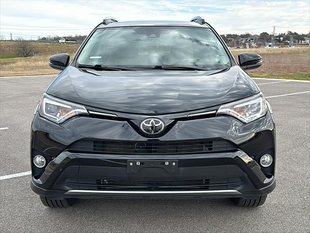 used 2018 Toyota RAV4 car, priced at $25,000