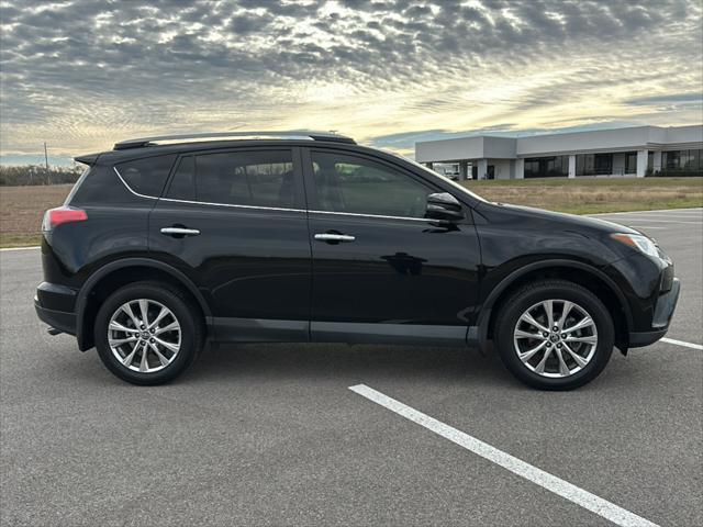 used 2018 Toyota RAV4 car, priced at $25,000