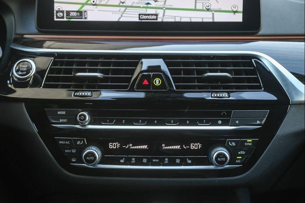 used 2023 BMW 530e car, priced at $34,881