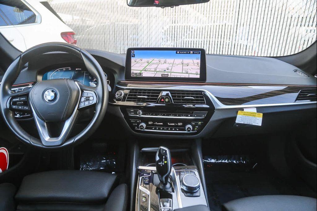 used 2023 BMW 530e car, priced at $34,881