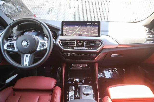 used 2025 BMW X4 car, priced at $54,994
