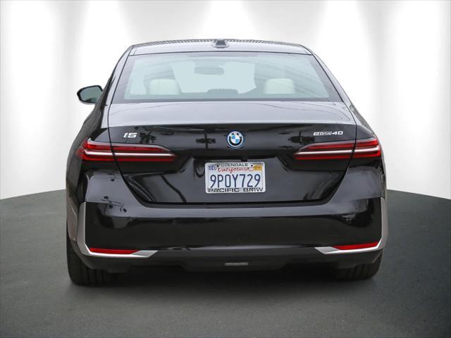 used 2025 BMW i5 car, priced at $64,000