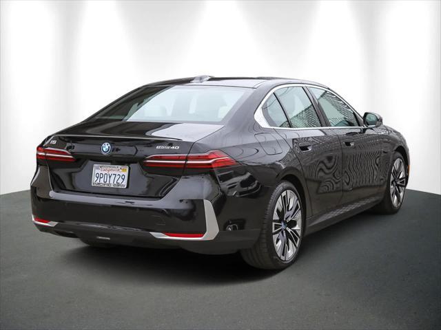 used 2025 BMW i5 car, priced at $64,000
