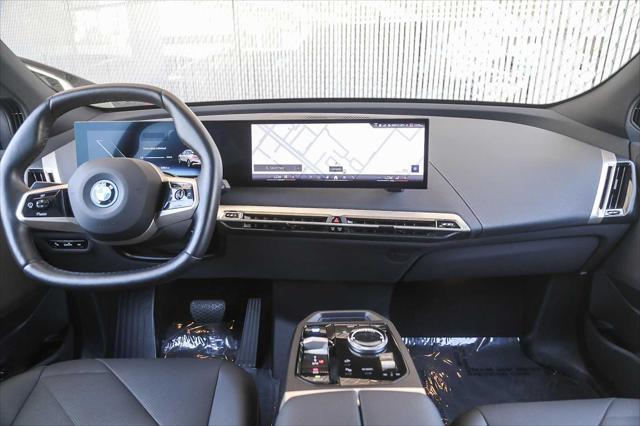 used 2025 BMW iX car, priced at $86,000