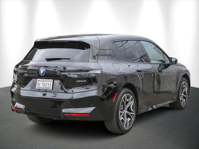 used 2025 BMW iX car, priced at $86,543
