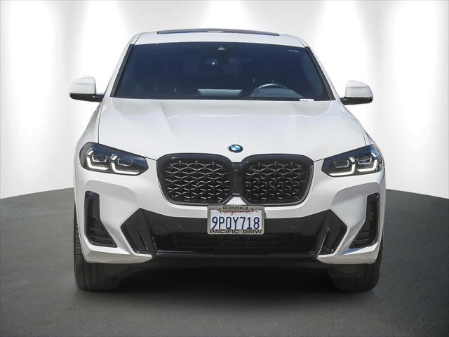 used 2025 BMW X4 car, priced at $54,994