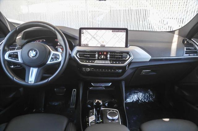 used 2025 BMW X4 car, priced at $54,994