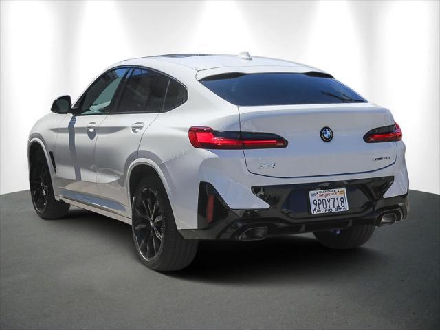 used 2025 BMW X4 car, priced at $54,994