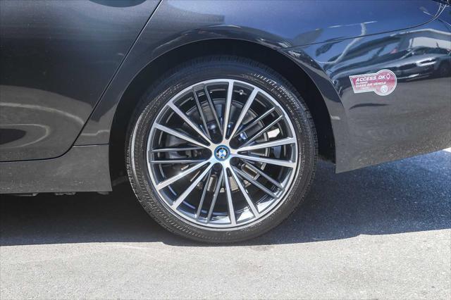 used 2023 BMW 530e car, priced at $39,881