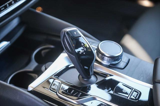 used 2023 BMW 530e car, priced at $39,881