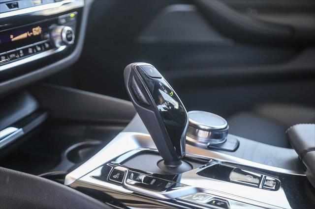 used 2023 BMW 530e car, priced at $39,881