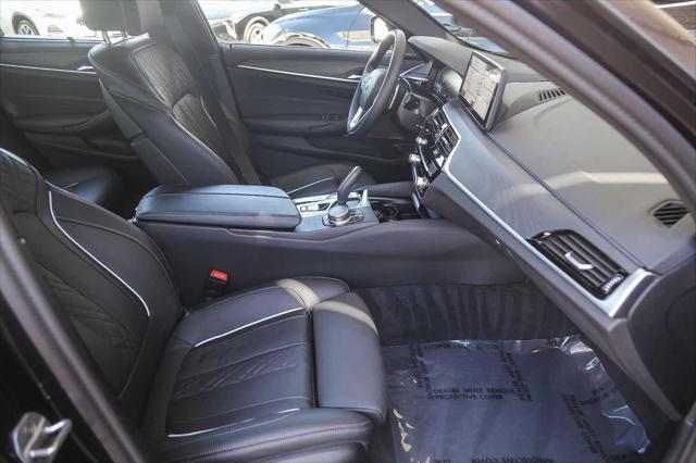 used 2023 BMW 530e car, priced at $39,881