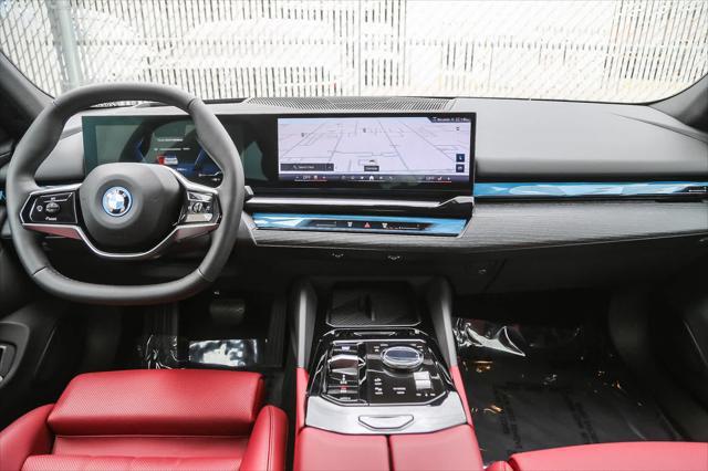 used 2025 BMW i5 car, priced at $62,555
