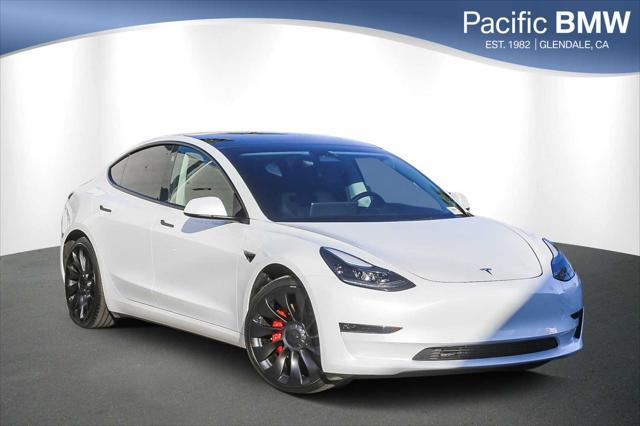 used 2022 Tesla Model 3 car, priced at $27,881