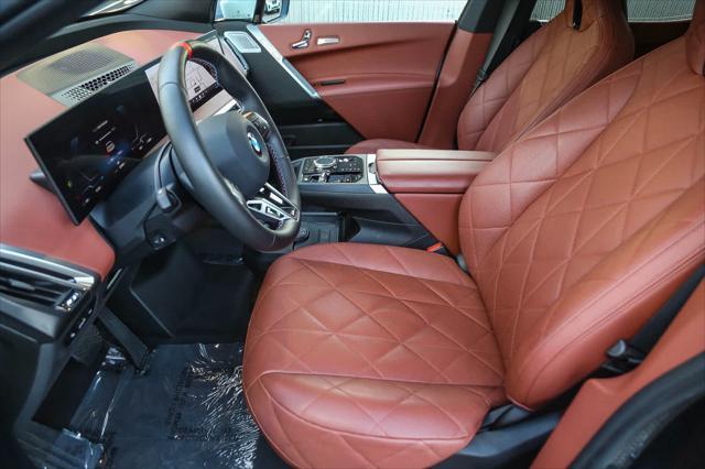 used 2025 BMW iX car, priced at $106,996