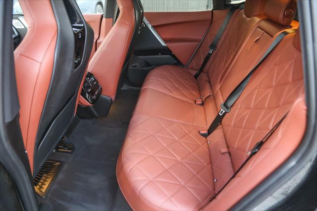 used 2025 BMW iX car, priced at $106,996