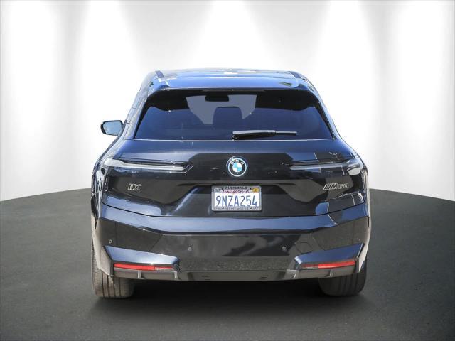 used 2025 BMW iX car, priced at $103,333