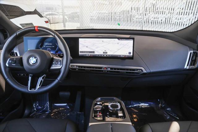 used 2025 BMW iX car, priced at $103,333