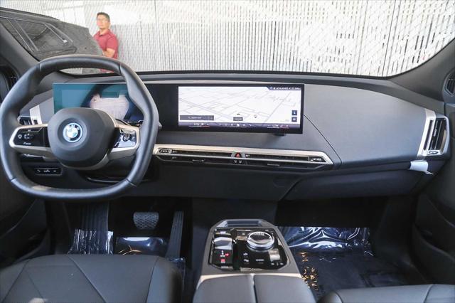 used 2025 BMW iX car, priced at $86,123